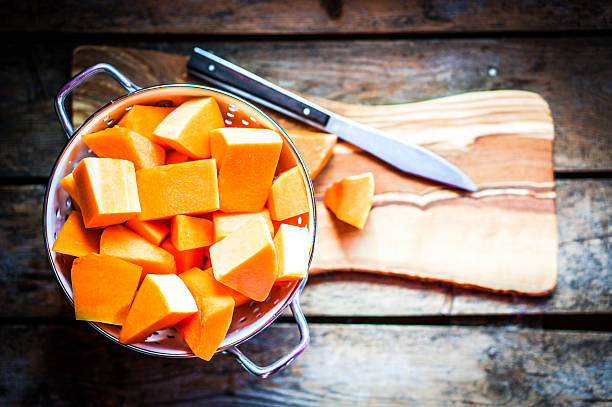 istock Fresh cut pumpkin on rustic wooden background 478859435
