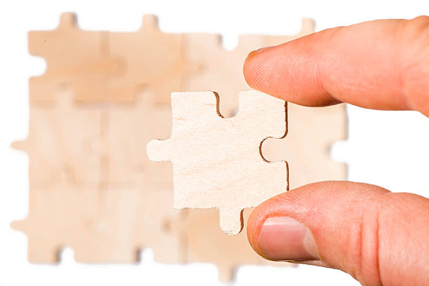 istock Wooden puzzle on white background.Close up 478861303