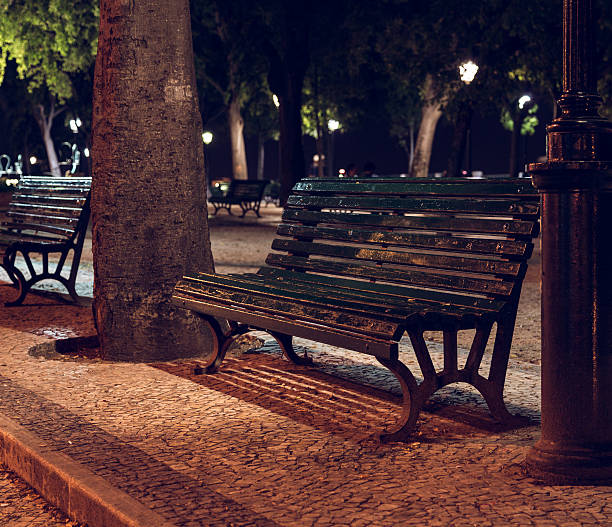 istock Wooden bench in night city 478863687