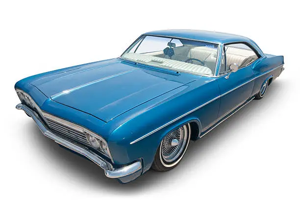 A blue 1966 lowrider, isolated on white with clipping path. 