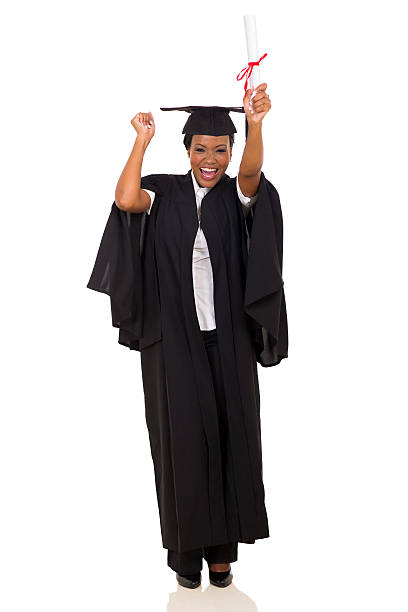 istock excited african graduate dancing 478865554