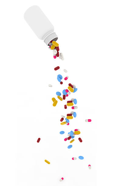 лекарственных препаратов - vitamin pill excess pill capsule стоковые фото и изображения