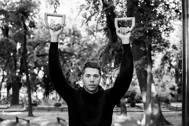istock Man photographed in street workout session. 478877438