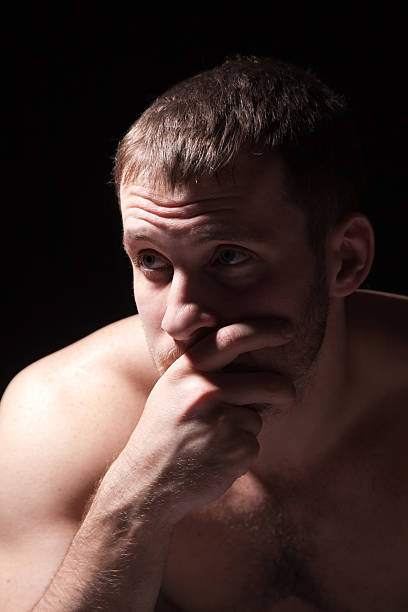 istock Image of shirtless man keeping his hand by face 478878238