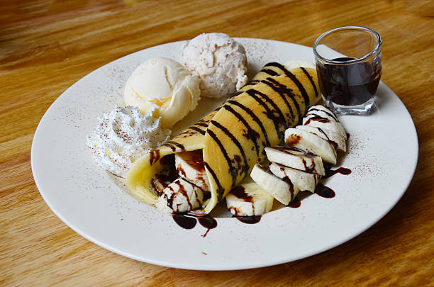 istock Banana waffle with ice cream and chocolate topping 478878332
