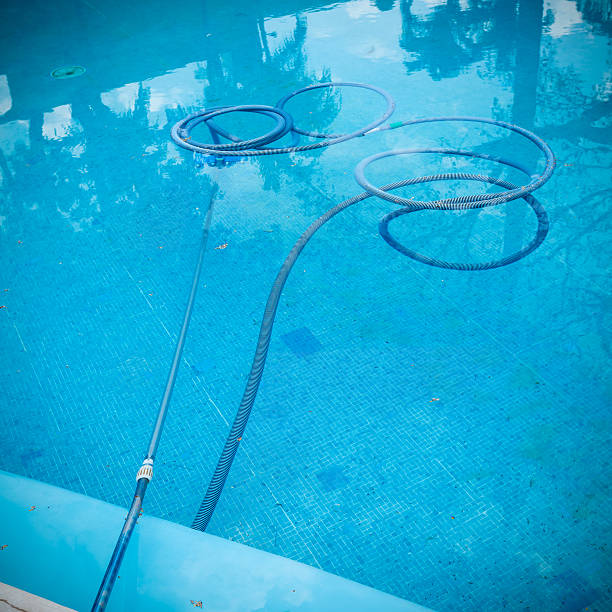 istock Process of cleaning swimming pool 478879254