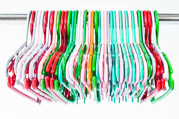 istock Colorful clothes hangers isolated on white 478879973