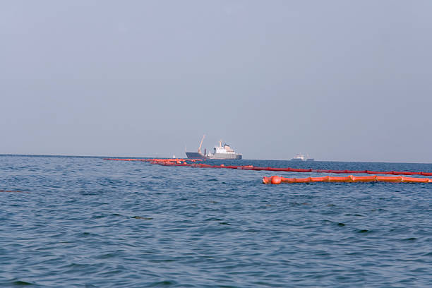 Boats cleaning up the oil spill off the coast of Alabama