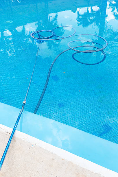 istock Process of cleaning swimming pool 478882322