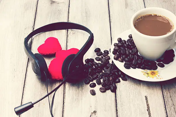 love music,Headphones and heart on the wooden floor