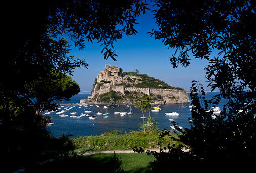 A freak of nature, a treasure trove of history. The Castello Aragonese is easily the most impressive historical monument in Ischia. It stands on a volcanic rock connected to the island by a bridge built in 1438 by Alfonso of Aragon. The Castle, overlooking the vast horizon of the sea, was originally built as a castrum in 474 BC by Gerone of Siracusa and, after a long period of abandonment, reached its golden period during the fourteenth century.  Under the Aragonese dynasty, it became a political, cultural and spiritual centre of notable interest. The Renaissance court of the noble poet Vittoria Colonna, saw the peak of the castle's splendour. Her court raised the Castello to heights of unheard glory: it breathed new life into the place; the arts and sciences flourished as never before under these skies - even Michelangelo was enticed here - but the decline had already begun in the 15th century and continued for more than 100 years.