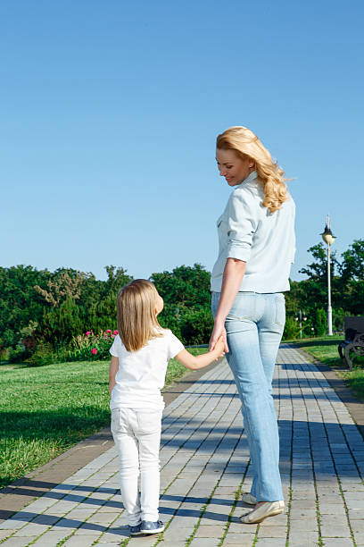 istock Mother and daughter during walk 478884540