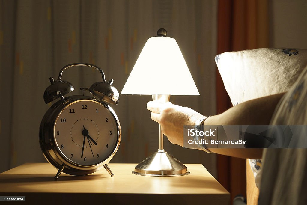 get out of bed in the middle of the night Lighting Equipment Stock Photo