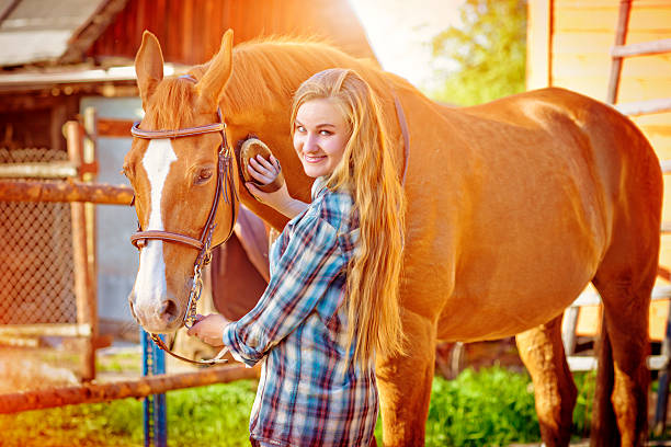 istock Young woman with her horse 478884914