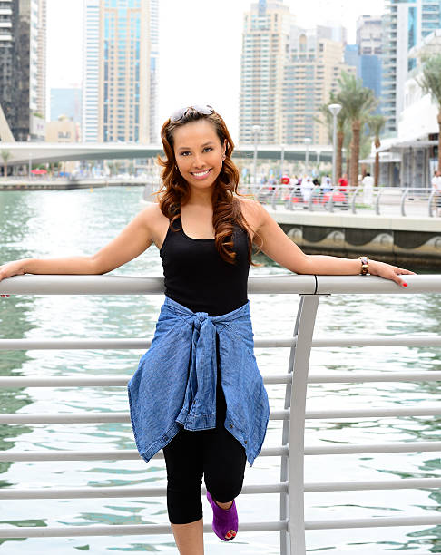 istock Young woman on vacation in Dubai 478891426