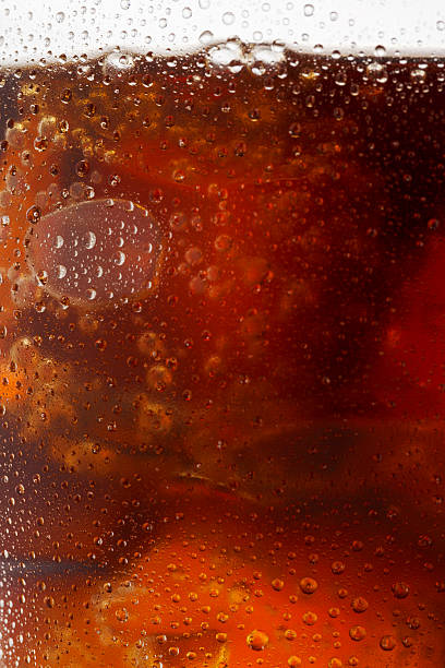 istock Ice cold cola drink    Glass of  Coca-Cola  with ice cubes 478893112