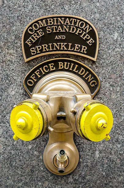 Combination fire standpipe and sprinkler outside an office building in the USA