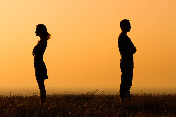 Relationship difficulties Silhouette of a angry woman and man on each other. relationship difficulties stock pictures, royalty-free photos & images
