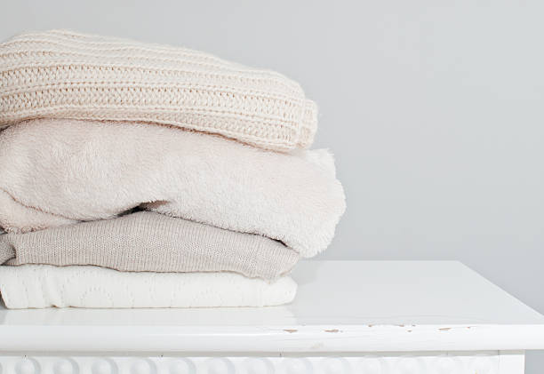 istock Knitting clothes in basket 478897278