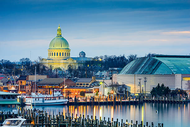 Annapolis Skyline Annapolis, Maryland, USA town skyline at Chesapeake Bay with the United States Naval Academy Chapel dome. chapel photos stock pictures, royalty-free photos & images