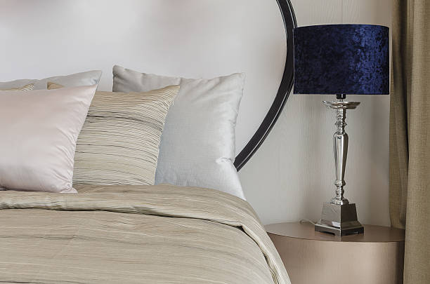 istock classic blue lamp on wooden table in bedroom 478903356