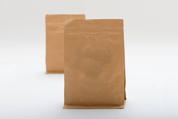 istock Two paper bags isolated on white background. 478906766