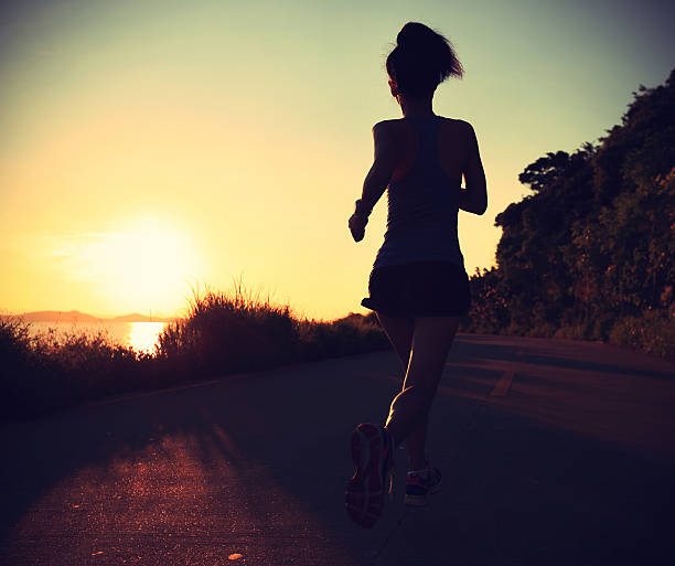 istock Runner athlete running at seaside road.vintage effect 478912162
