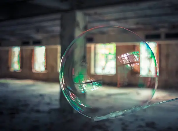 A colorful soapbubble in an old factory