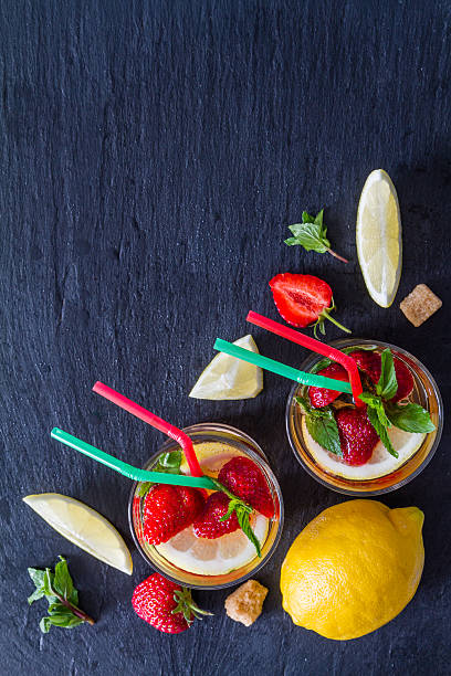 istock Strawberry lemonade ingredients - strawberry, lemon, mint, sugar 478915206