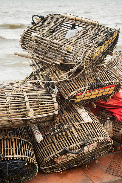 bamboo crab cages at kep market cambodia traditional bamboo crab cages at kep market cambodia kep stock pictures, royalty-free photos & images