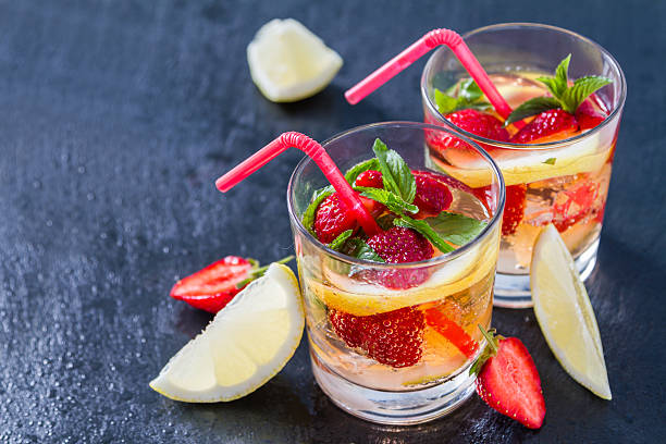 istock Strawberry lemonade and ingredients - strawberry, lemon, sugar, mint 478915494