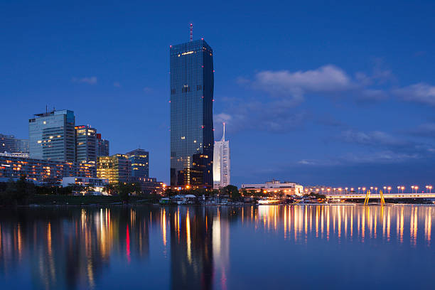 Skyline of Vienna, Donaustadt district, by the Danube river. The DC tower, the tallest building in Austria at 250 metres, rises above the other buildings.