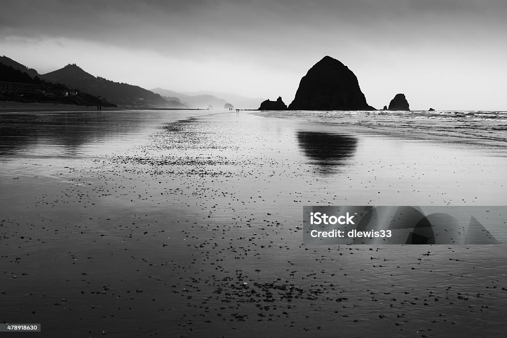 Haystack Rock on Oregon Coast Iconic Haystock Rock at Cannon Beach on the Oregon coast on a rainy day. 2015 Stock Photo