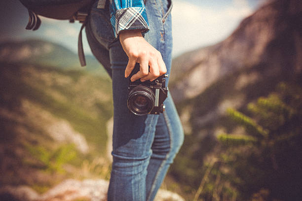 istock young woman photographer 478919324
