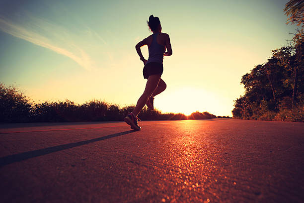 istock Runner athlete running at seaside road.vintage effect 478922542