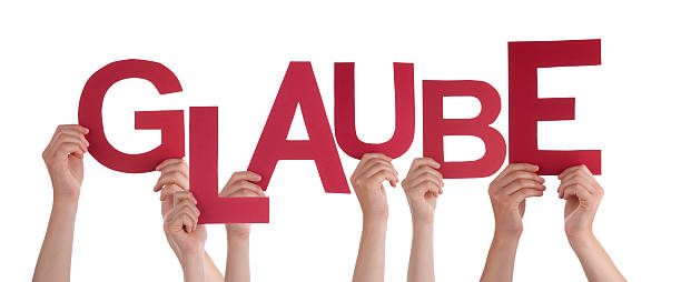 istock People Holding German Word Glaube Means Belief 478923772