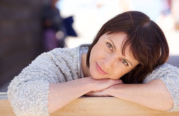 istock Attractive older woman relaxing 478931556