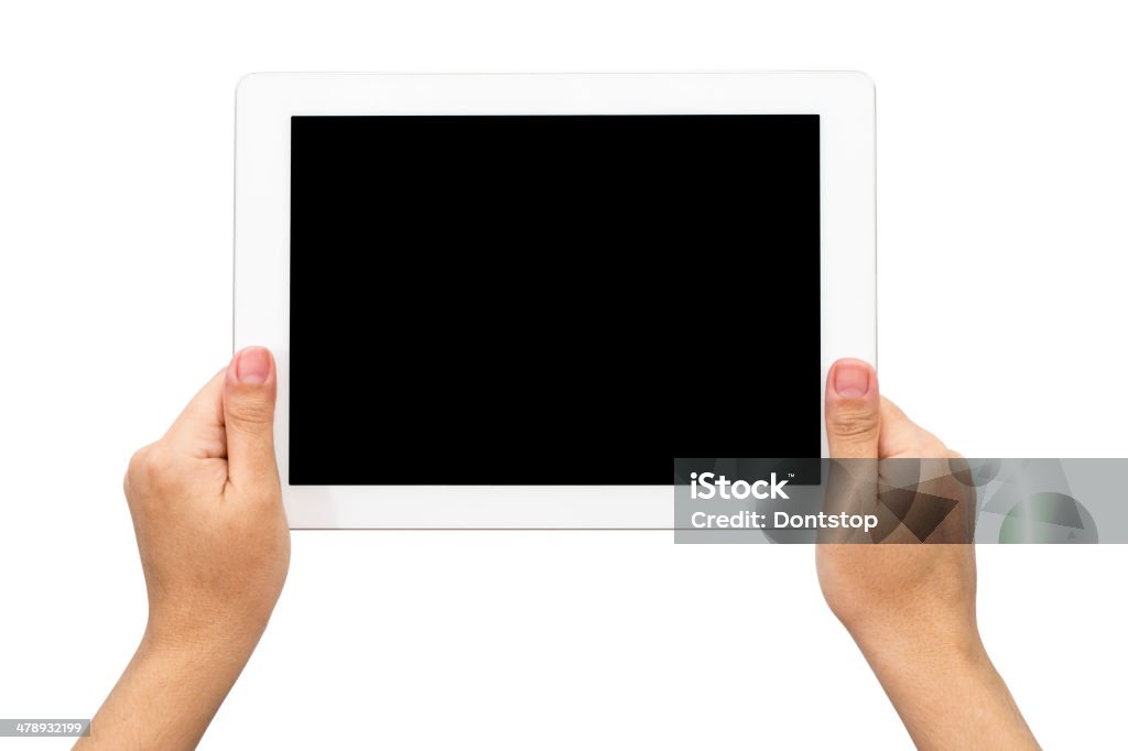 Trzymając tablet - Zbiór zdjęć royalty-free (Fotografika)