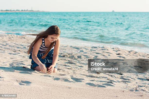 10years Old Girl On The Beach Stock Photo - Download Image Now - 14-15 Years, 2015, Adolescence
