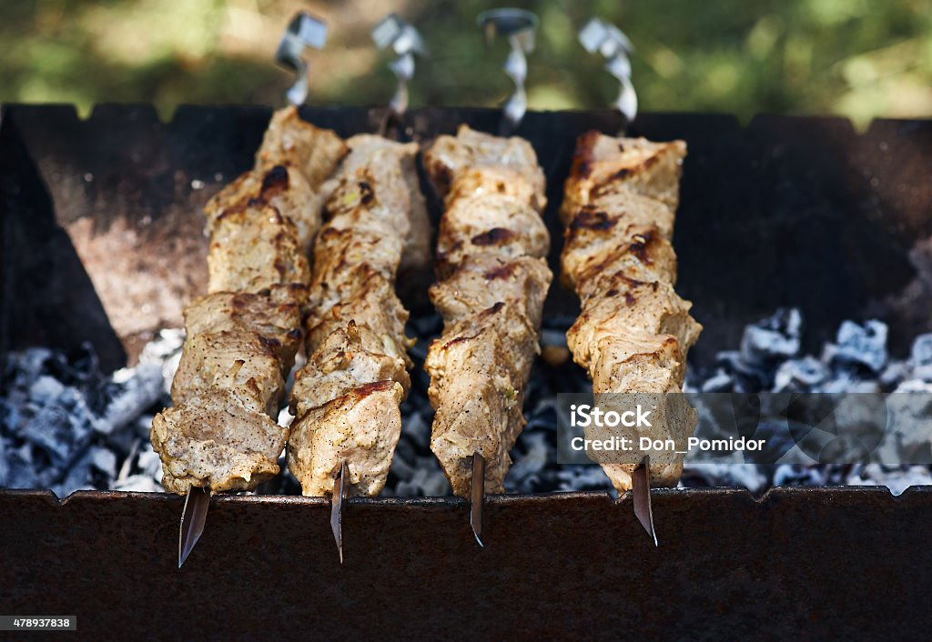 shish kebab on skewers Shish kebab on skewers on the grill Kebab Stock Photo