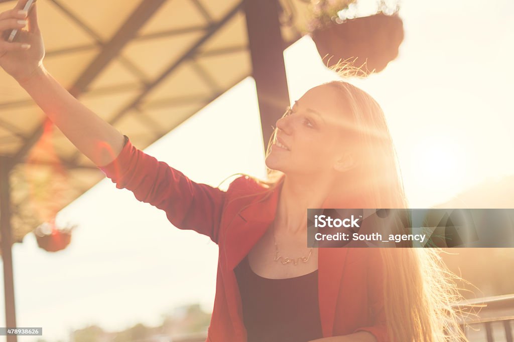 Girl having fun taking selfie Beautiful Hipster Girl Taking Selfie 20-29 Years Stock Photo