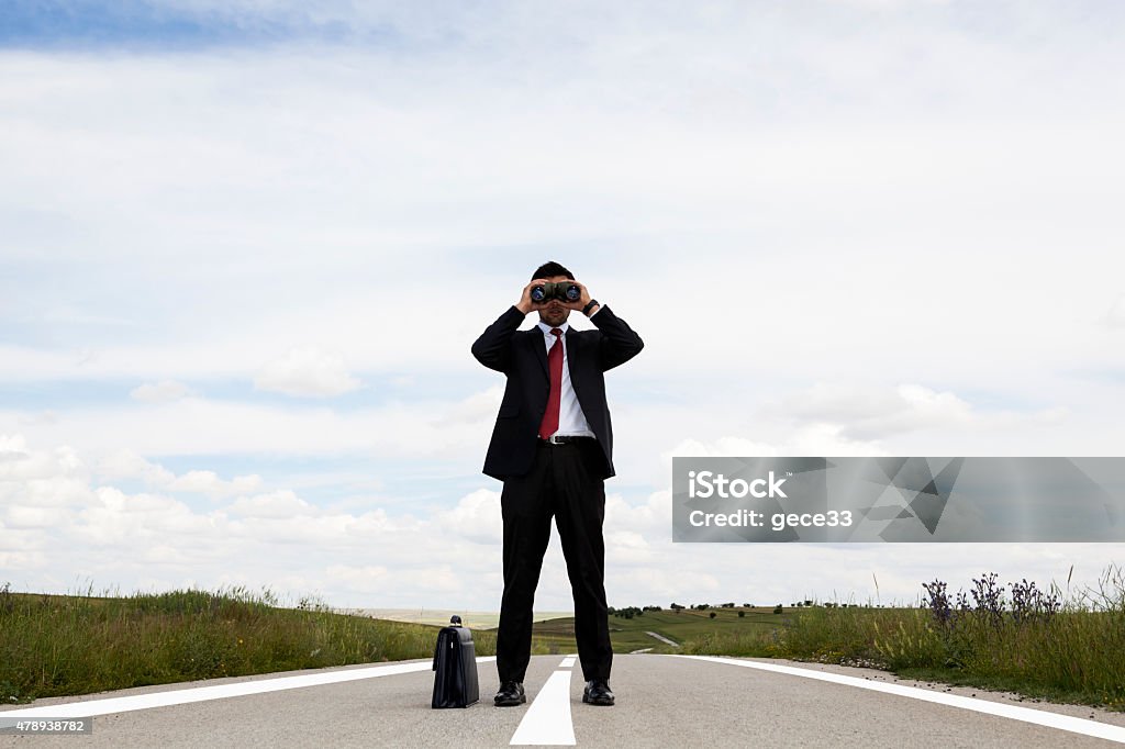 Businessman with binocular on travel Leadership Stock Photo