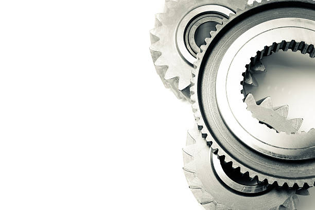 istock Three gear transmission mechanics, machine teeth and steel cog wheels 478939883