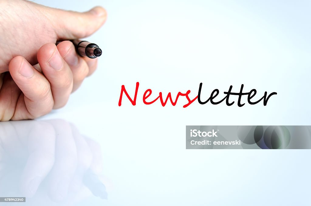 Newsletter concept Pen in the hand isolated over white background Newsletter concept 2015 Stock Photo