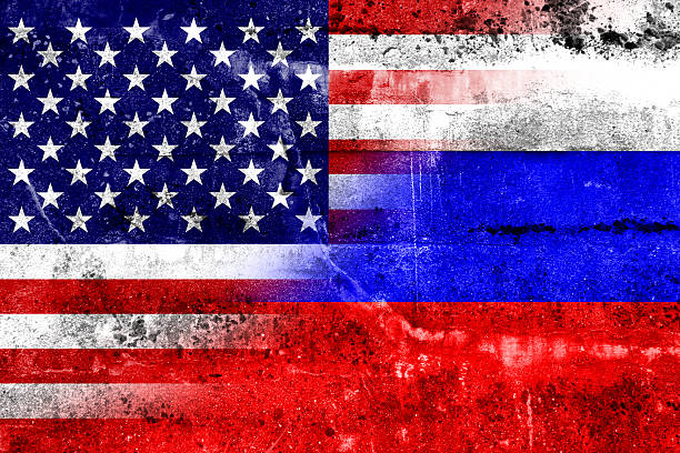 istock USA and Russia Flag painted on grunge wall 478943265