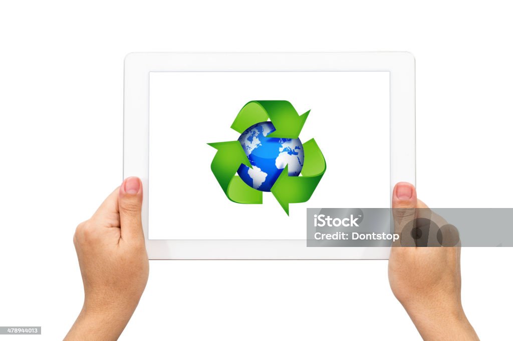 Recycle Earth symbol with holding tablet Recycle earth symbol with holding tablet, isolated on white. Color Image Stock Photo