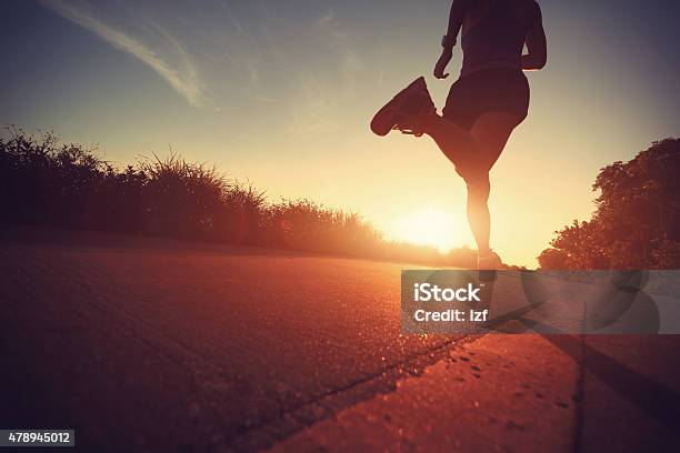 Runner Athlete Running At Seaside Roadvintage Effect Stock Photo - Download Image Now