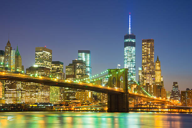 istock Lower Manhattan with One WTC and Brooklyn Bridge at dusk 478945226