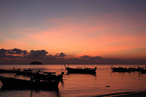 istock long tail boats   sunset at Koh Lipe 478945809
