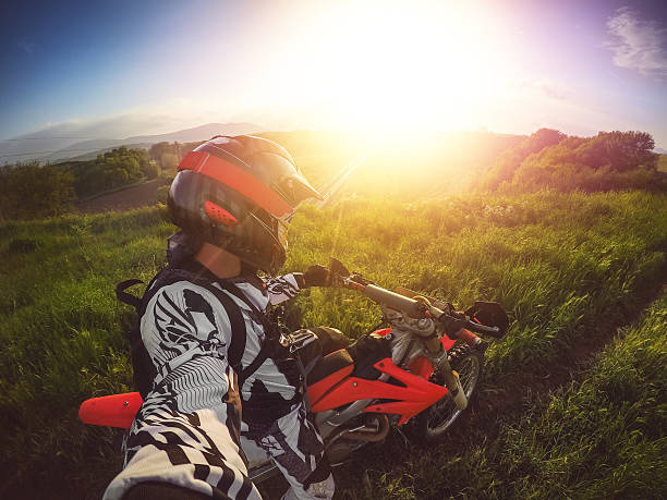 Motocross/Enduro rider on track, strong grain added to create atmosphere.